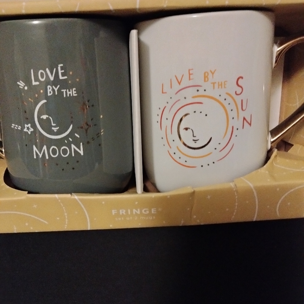 Set of 2 mugs.  Color: green & beige & white.